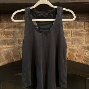 Lululemon love tank. Good used condition. No flaws just a little faded.